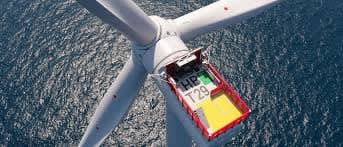 Cargo drone delivering supplies to offshore wind turbine